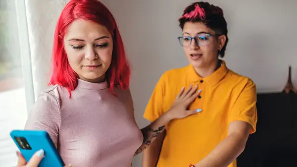 Couple arguing over phone