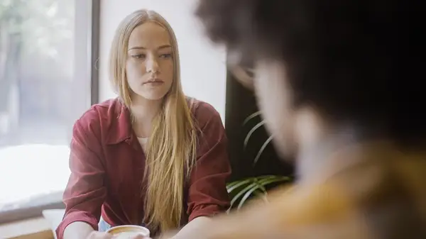 Couple sitting and talking together