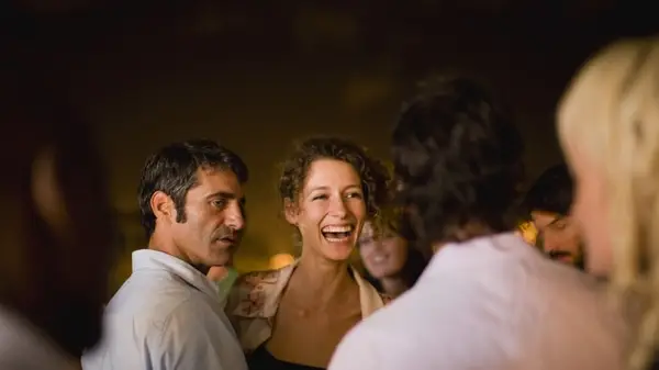 couple together at dinner party