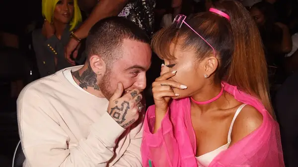 Ariana Grande posing with Mac Miller