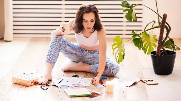 Woman crafting on the floor