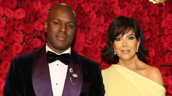Corey Gamble posing with Kris Jenner