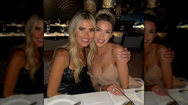 Christina Haack and Heather Rae El Moussa at a restaurant table together