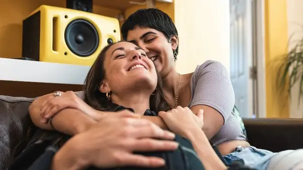 Couple hugging and smiling 