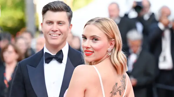 Colin Jost and Scarlett Johansson on the red carpet