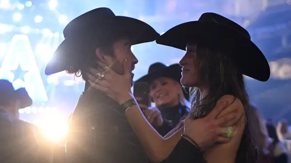 Bella Hadid holding Adan Banuelos