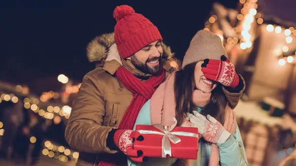 Couple swapping presents