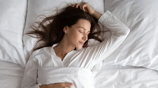 Woman sleeping in bed