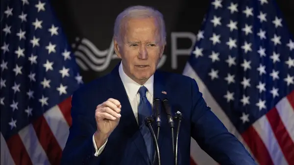 Joe Biden speaking on stage