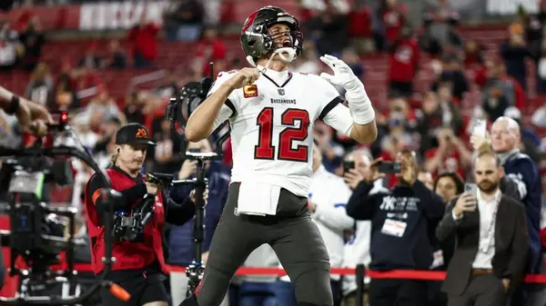 Tom Brady playing football