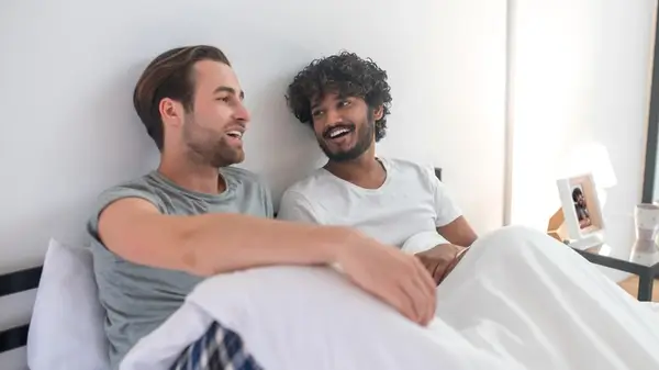 Gay couple in bed