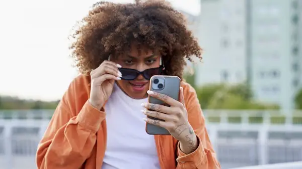 Shocked looking at phone