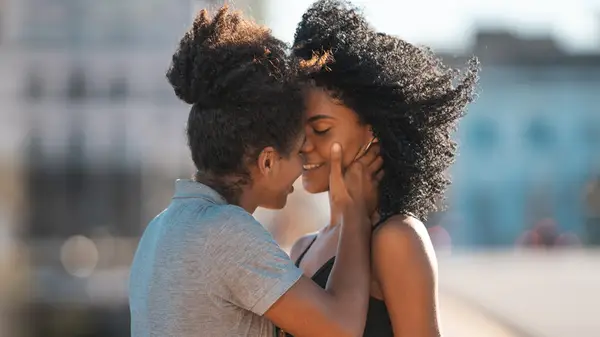 coupling embracing and kissing