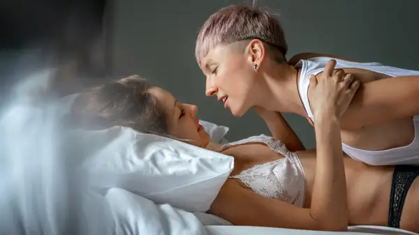 Queer couple in bed