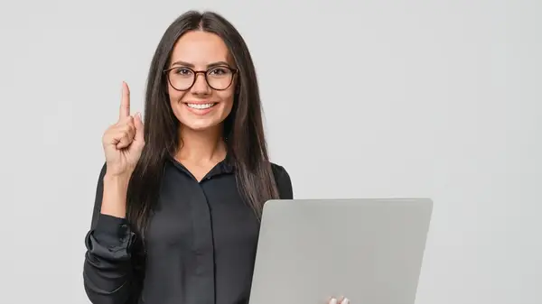 woman holding up a finger