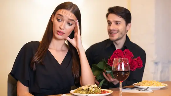 Woman turning away from a man