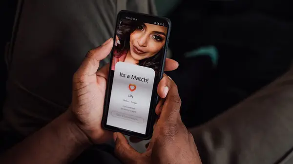 man holding dating app