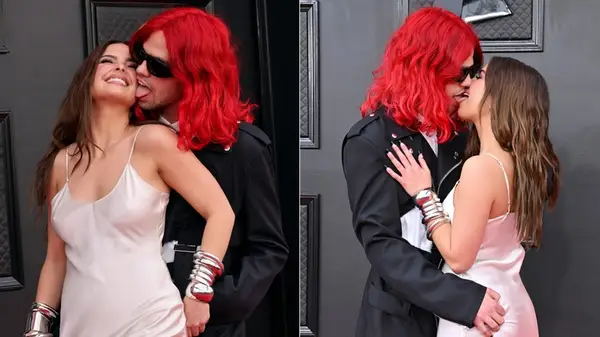 Omer Fedi kissing Addison Rae on the red carpet