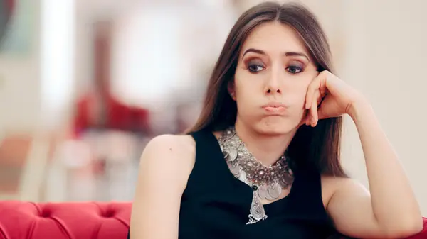 bored woman on couch