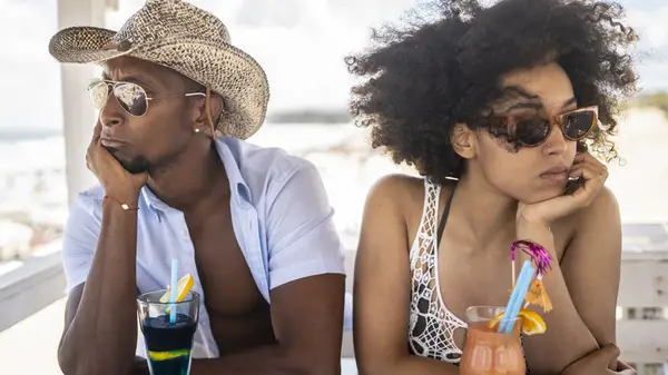 man and woman arguing