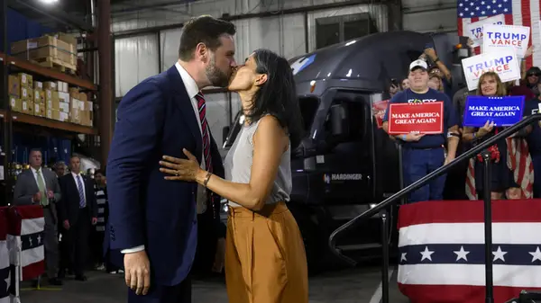 JD kisses Usha Vance