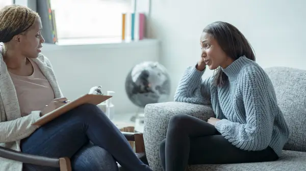 crying woman in therapy