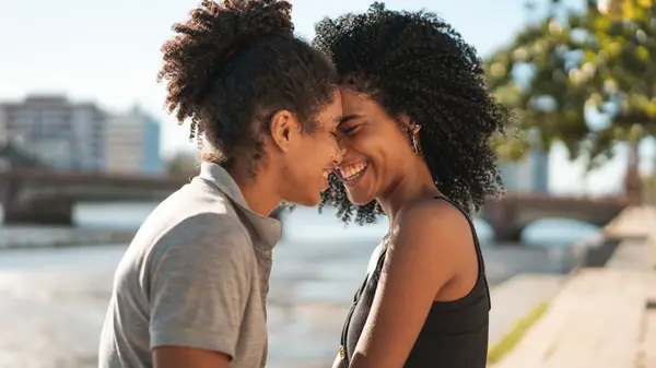 Queer couple nuzzling