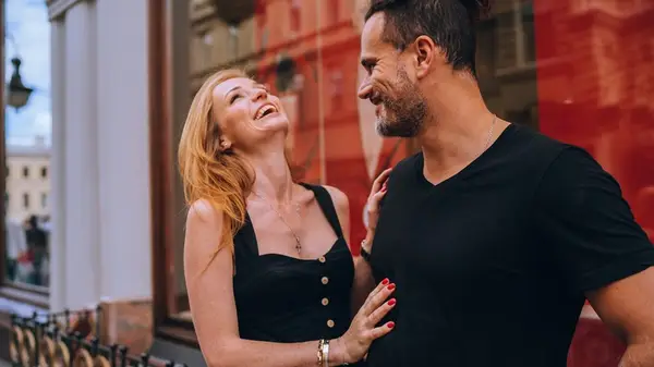 woman and man flirting