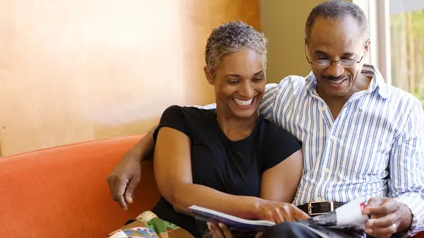 Older couple reading 