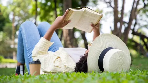 Woman reading at the park