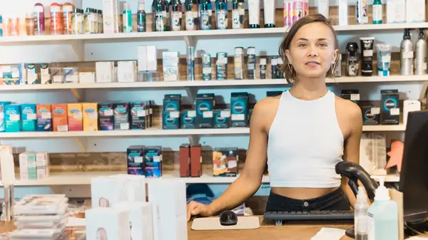 Woman selling lube at store