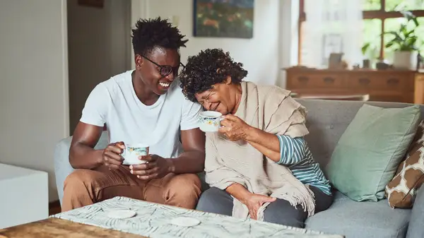 Man laughing with his mother