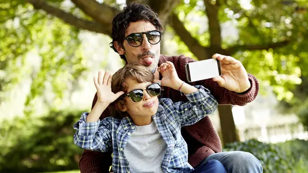 Man playing with child