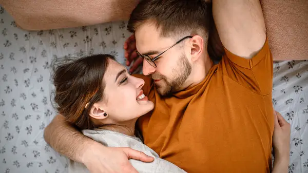 Couple in bed together 