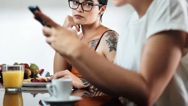 angry woman staring at girlfriend