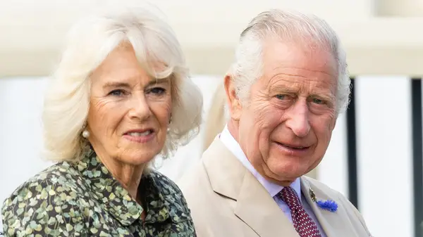 King Charles III and Queen Camilla outside