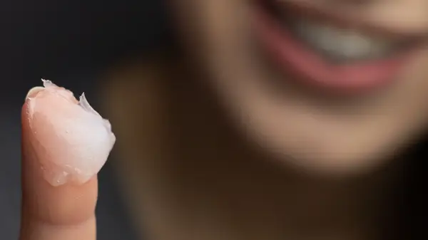 Petroleum jelly on finger