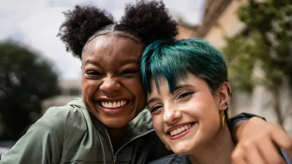 Two women smiling