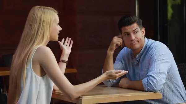 Man and woman talking