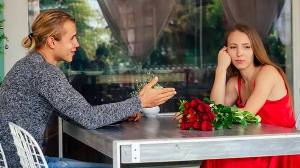 Woman and man talking