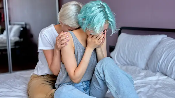 lesbian couple embracing