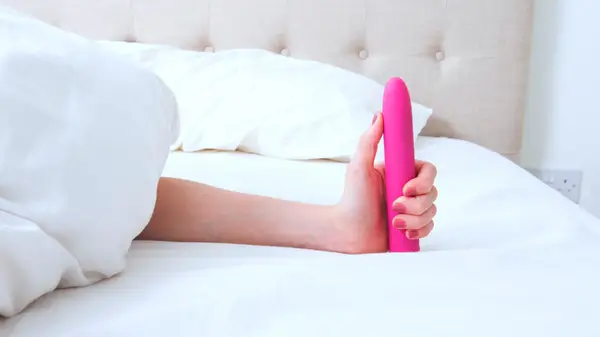 hand holding vibrator
