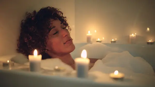 Woman in bubble bath