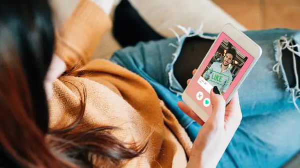 Woman uses dating app