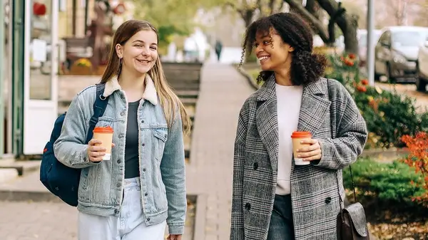 two girls talking to eachother