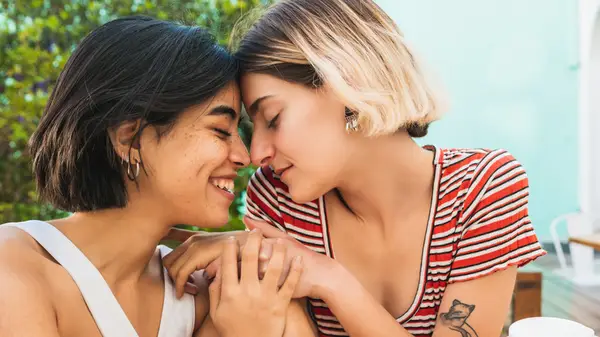 lesbian couple embracing