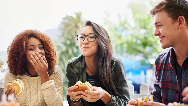 three friends having lunch