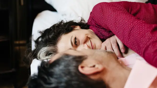 woman and man embracing