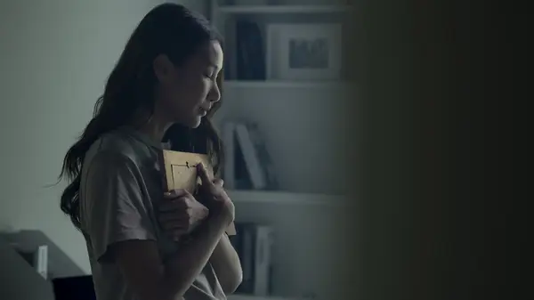 Woman grieves loved one