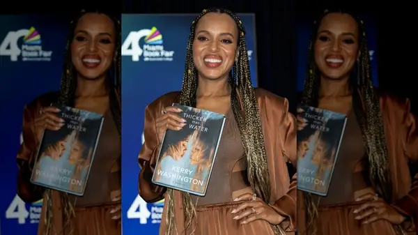 Kerry Washington holding her book